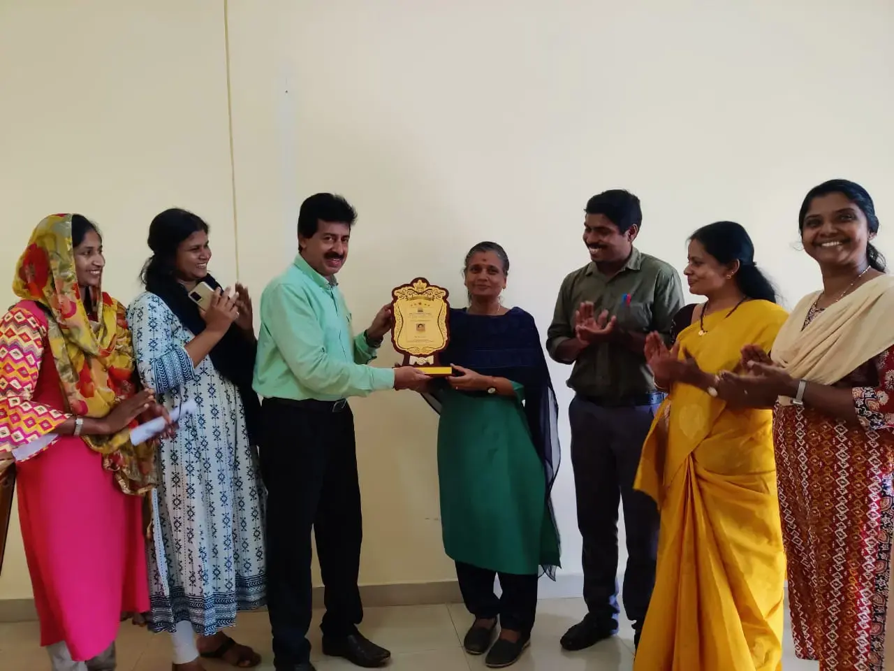 Honouring PHD fro Dr.Kala Mam